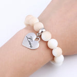 Romantic Vintage Bracelet with Heart Pendant - Stones & Vine